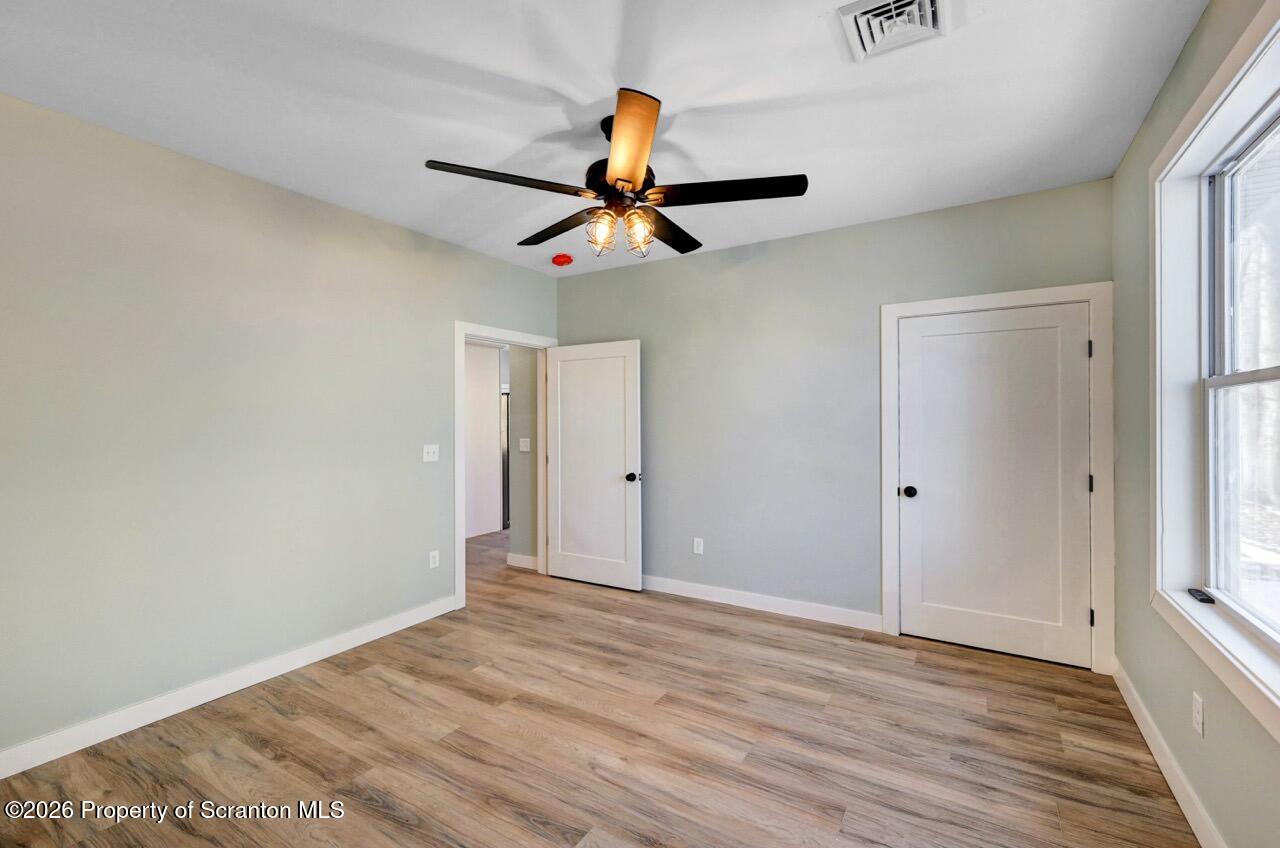 119 Prospect Avenue Scranton, PA 18505 - Photo 16 of 43 a view of room with a ceiling fan