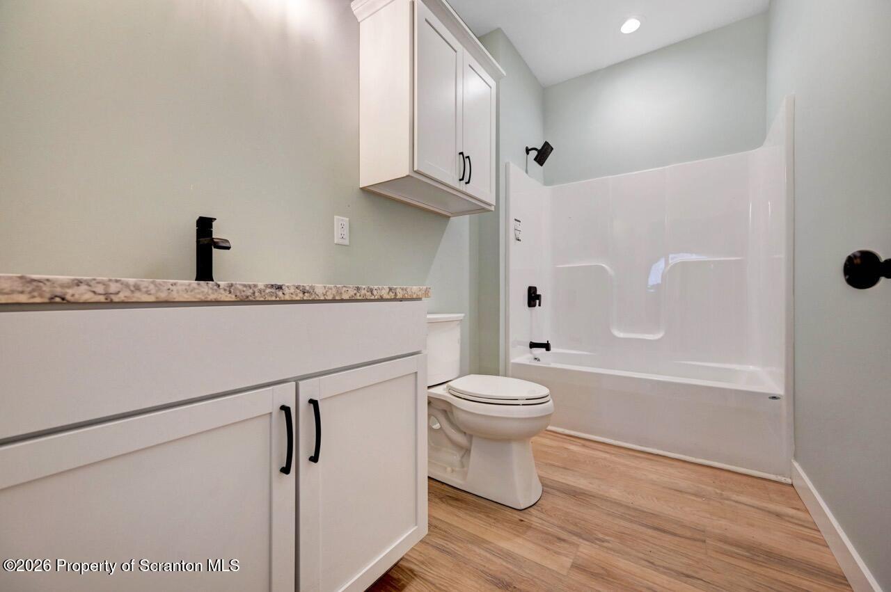 119 Prospect Avenue Scranton, PA 18505 - Photo 39 of 43 a bathroom with a toilet a sink and a bathtub