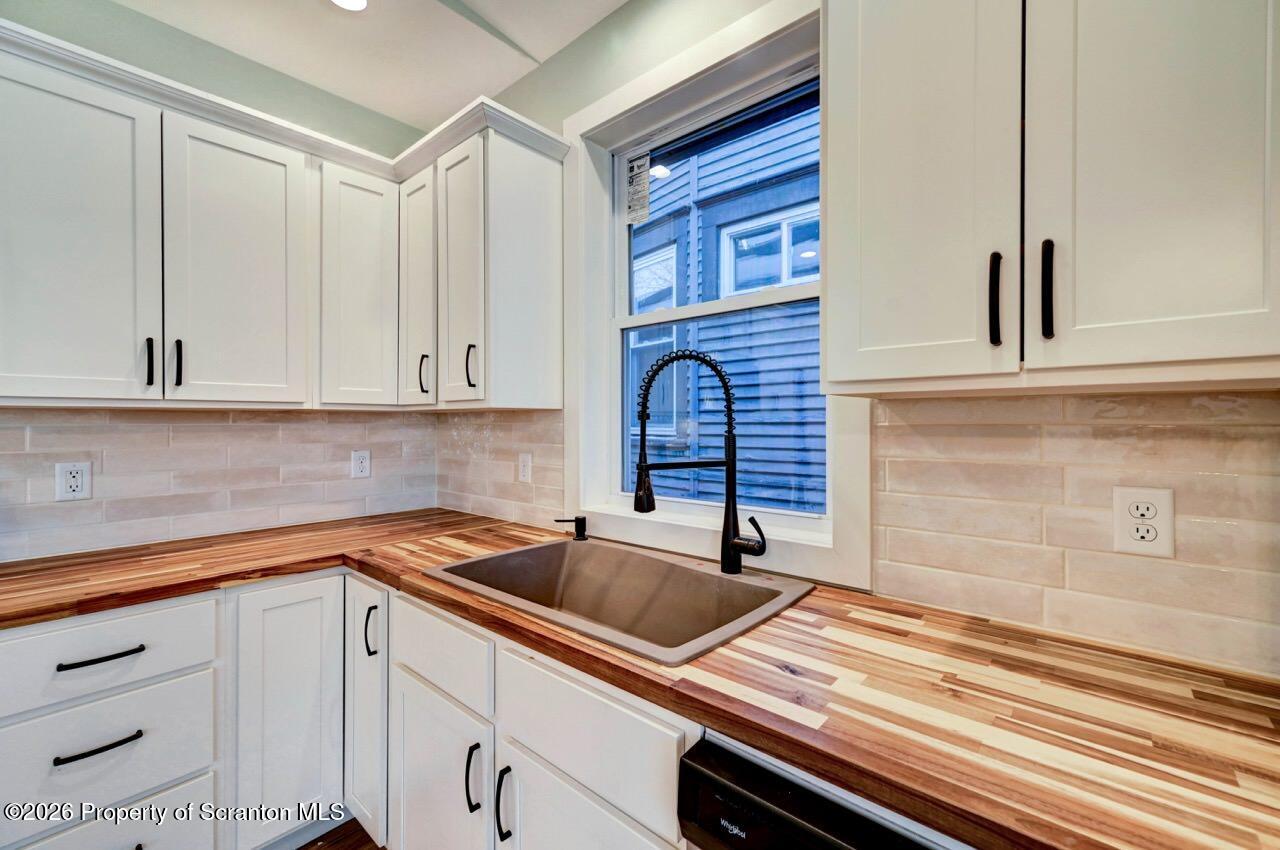 119 Prospect Avenue Scranton, PA 18505 - Photo 9 of 43 a kitchen with a sink and cabinets