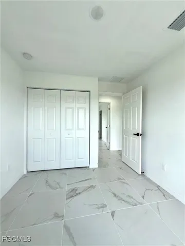 an empty room with window