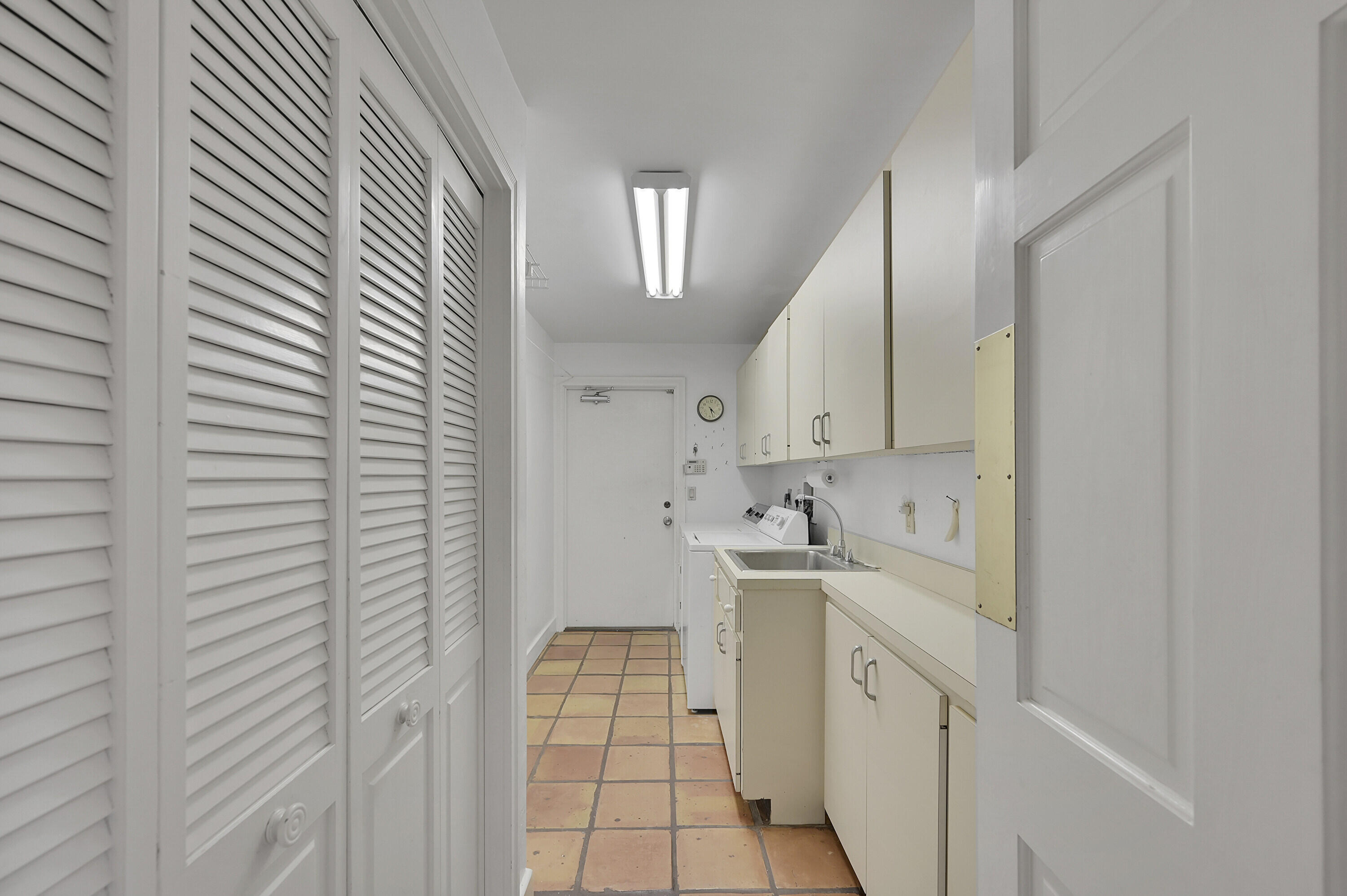 2650 Northwest 23rd Way Boca Raton, FL 33431 - Photo 43 of 58 INSIDE LAUNDRY AND TUB