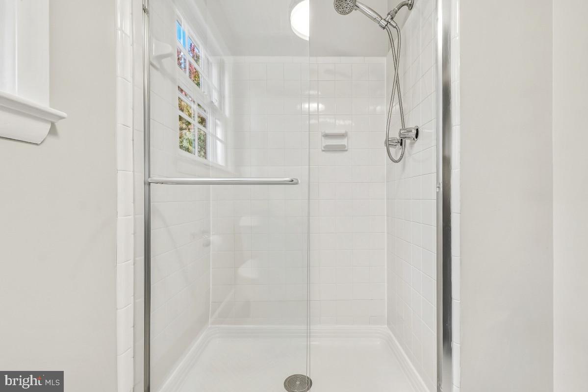307 Indian Spring Drive Silver Spring, MD 20901 - Photo 17 of 40 Primary Bath with a Glass Enclosed Shower
