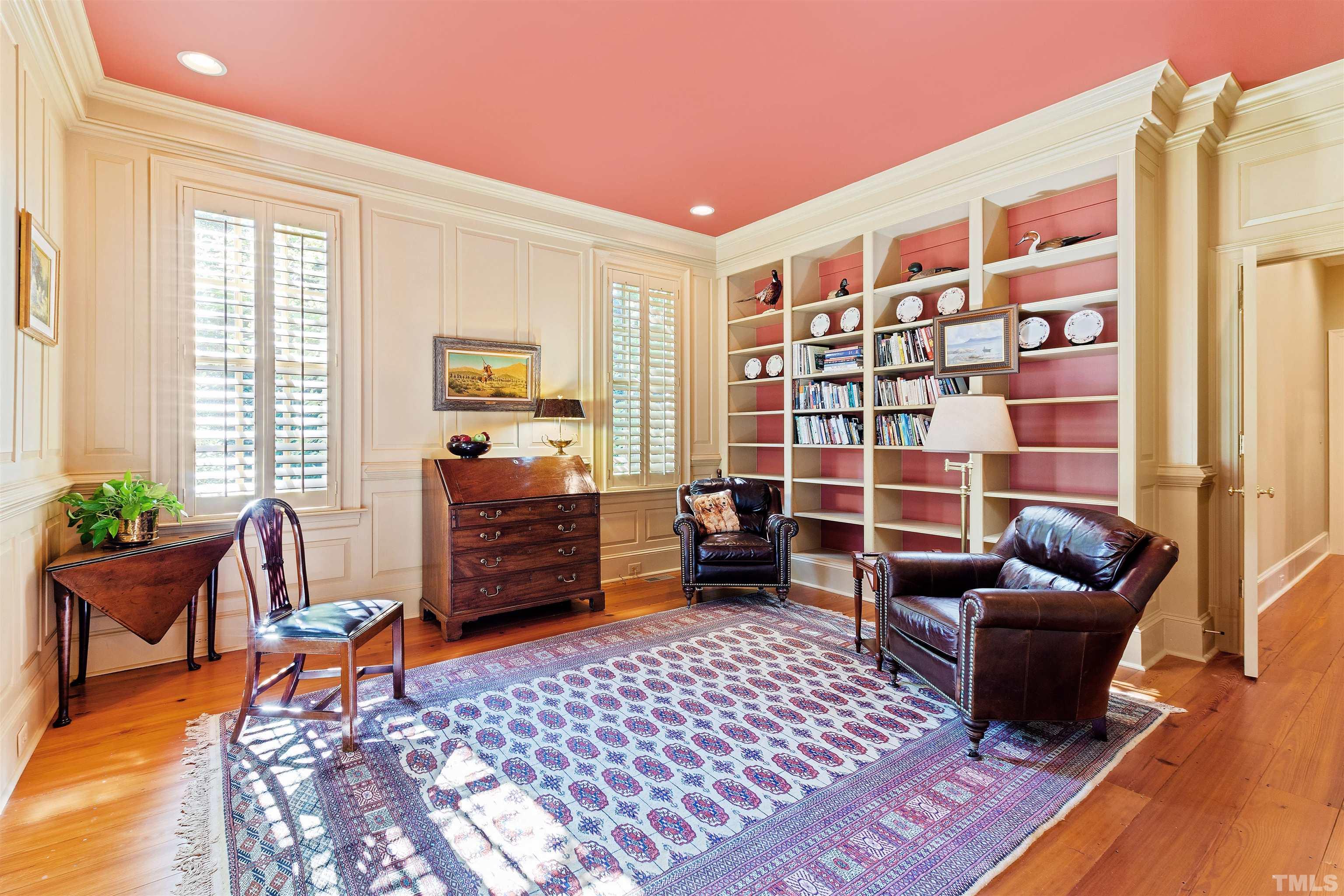 1029 Harvey Street Raleigh, NC 27608 - Photo 23 of 63 a living room with furniture and a gate