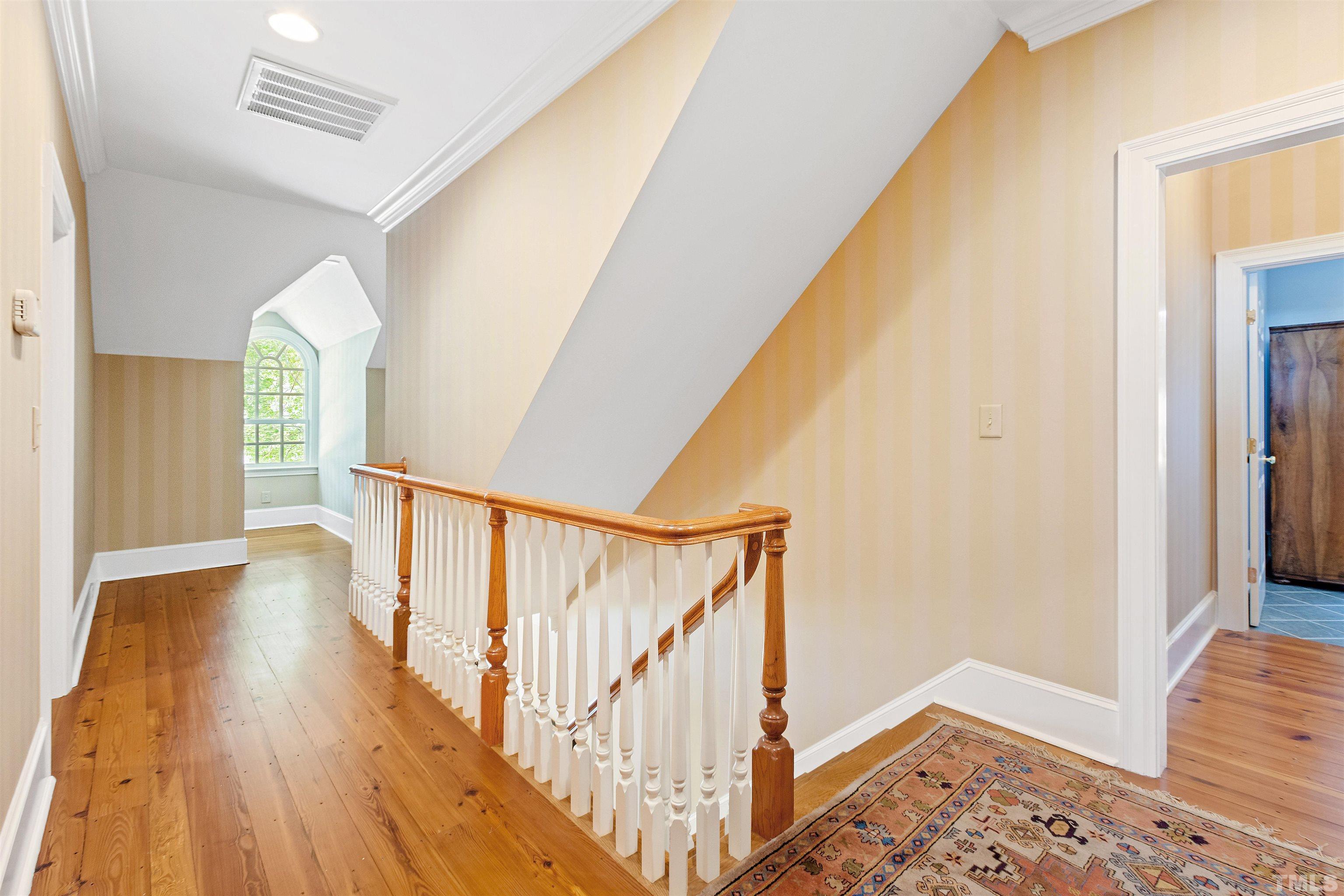1029 Harvey Street Raleigh, NC 27608 - Photo 33 of 63 a view of entryway with wooden floor
