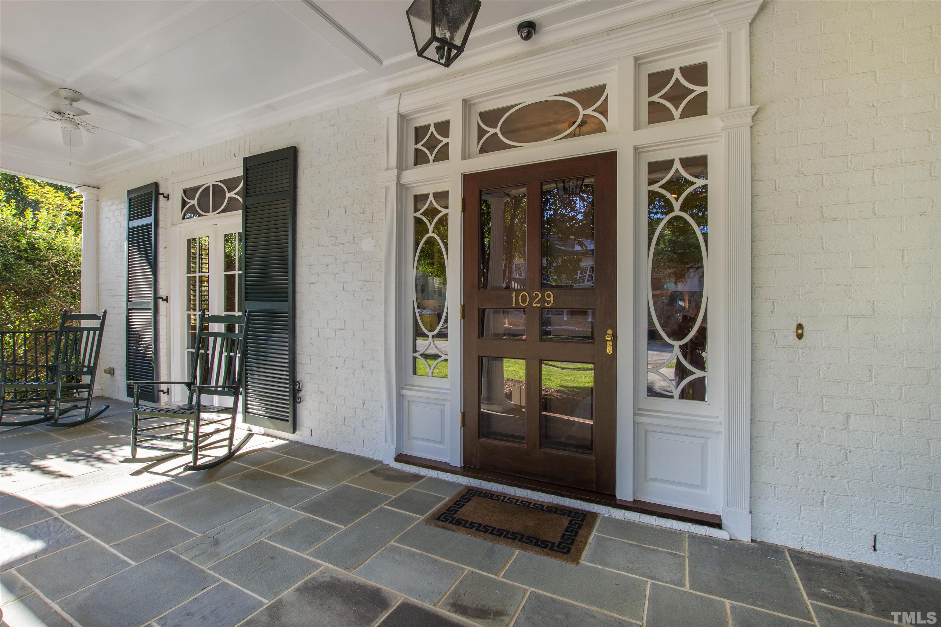 1029 Harvey Street Raleigh, NC 27608 - Photo 4 of 63 a view of an entryway with a glass door