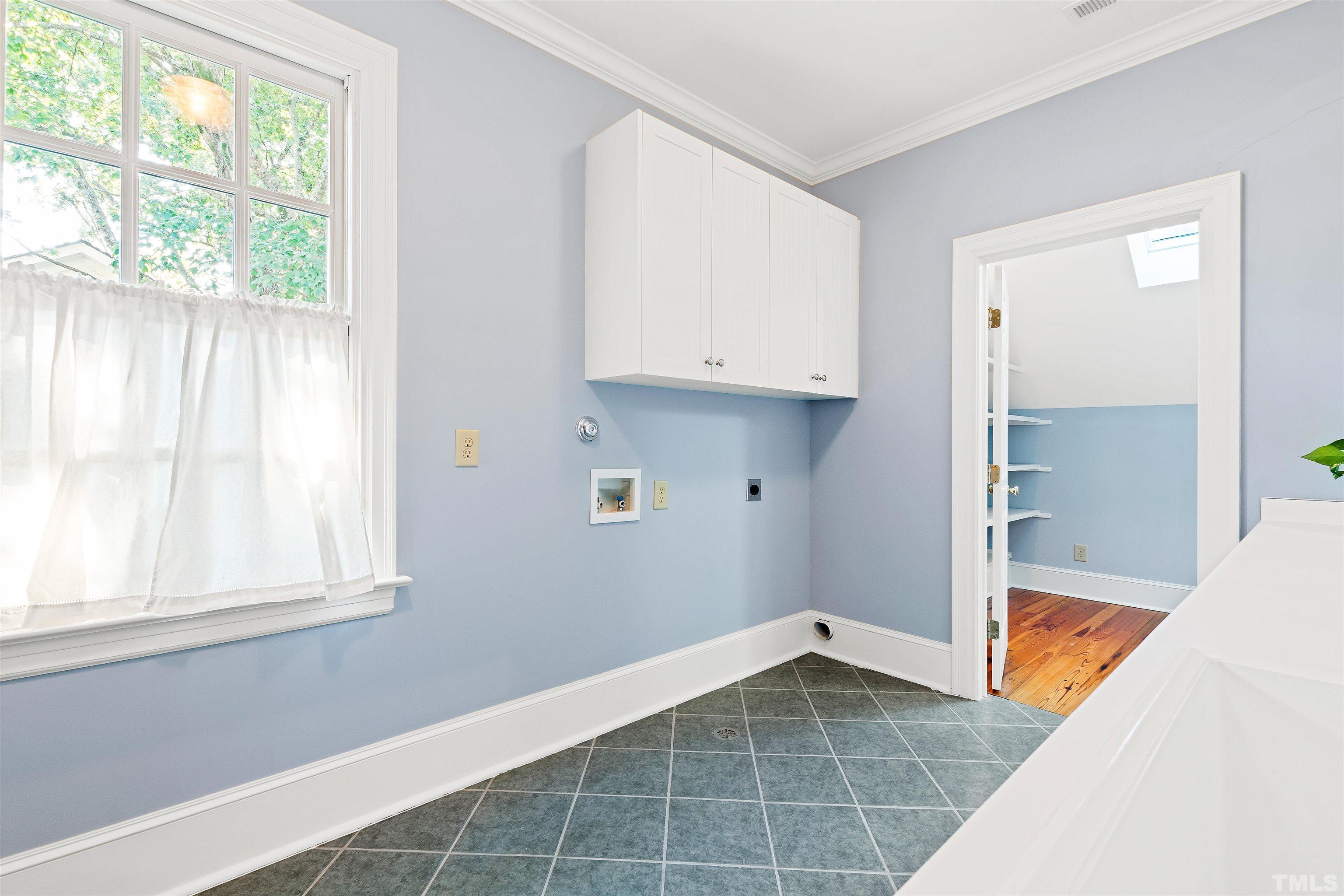 1029 Harvey Street Raleigh, NC 27608 - Photo 48 of 63 a view of an empty room with a window