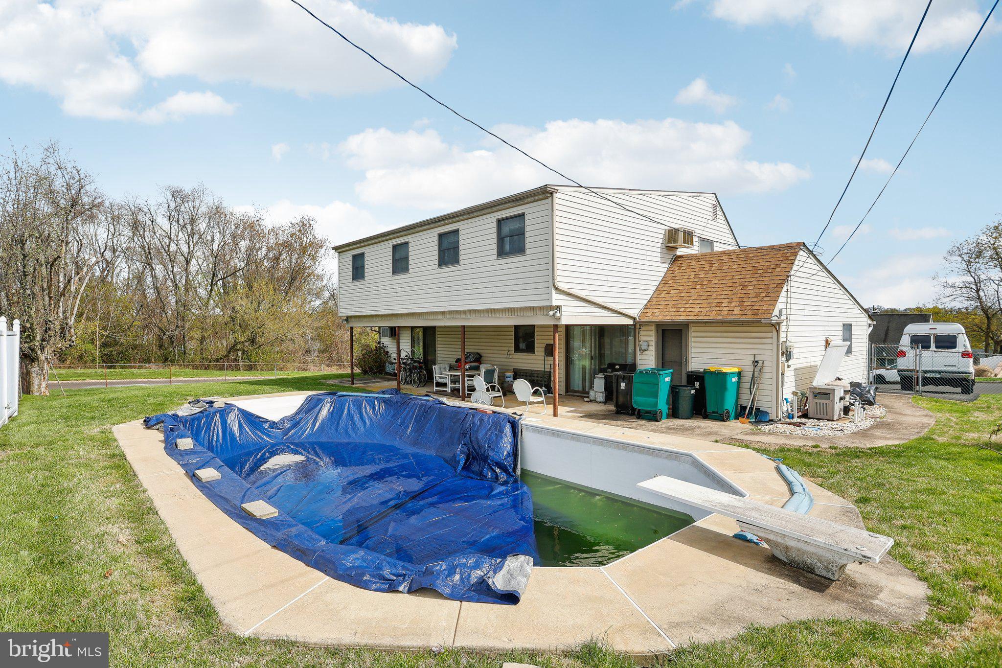 63 Tinsel Road Levittown, PA 19056 - Photo 12 of 16 Pool with diving board