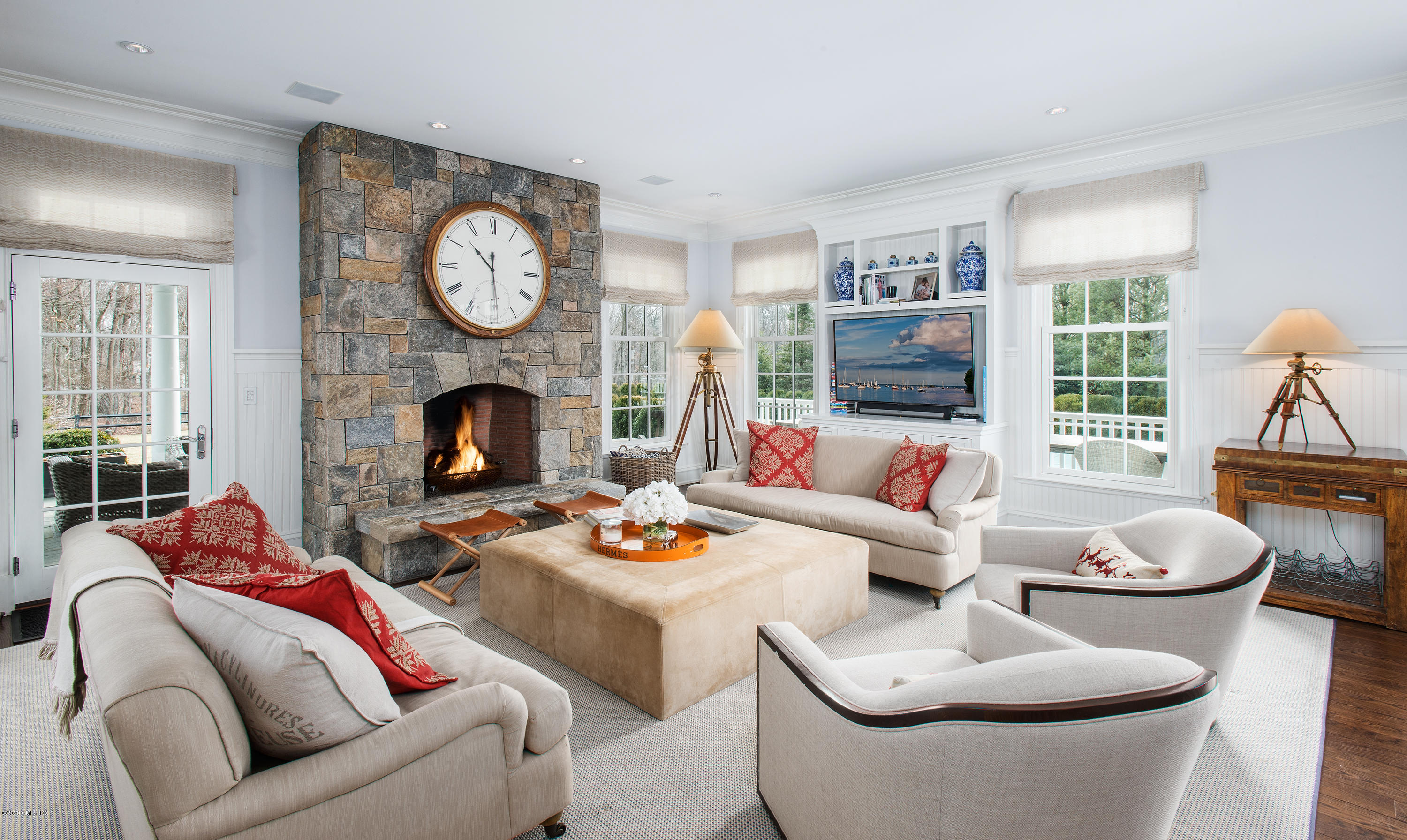 751 Lake Avenue Greenwich, CT 06830 - Photo 12 of 38 a living room with furniture and a fireplace