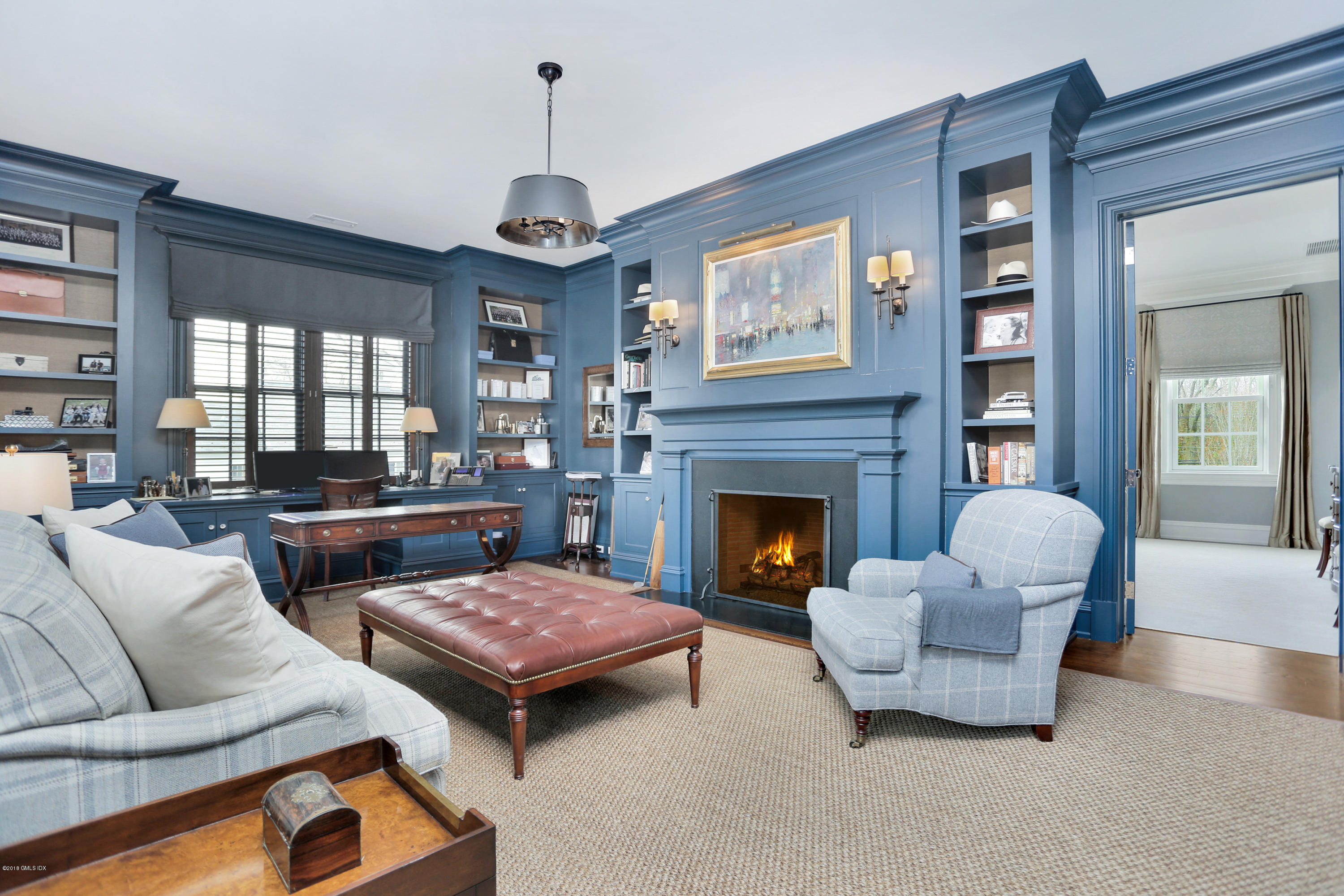 751 Lake Avenue Greenwich, CT 06830 - Photo 17 of 38 a living room with furniture and a fireplace