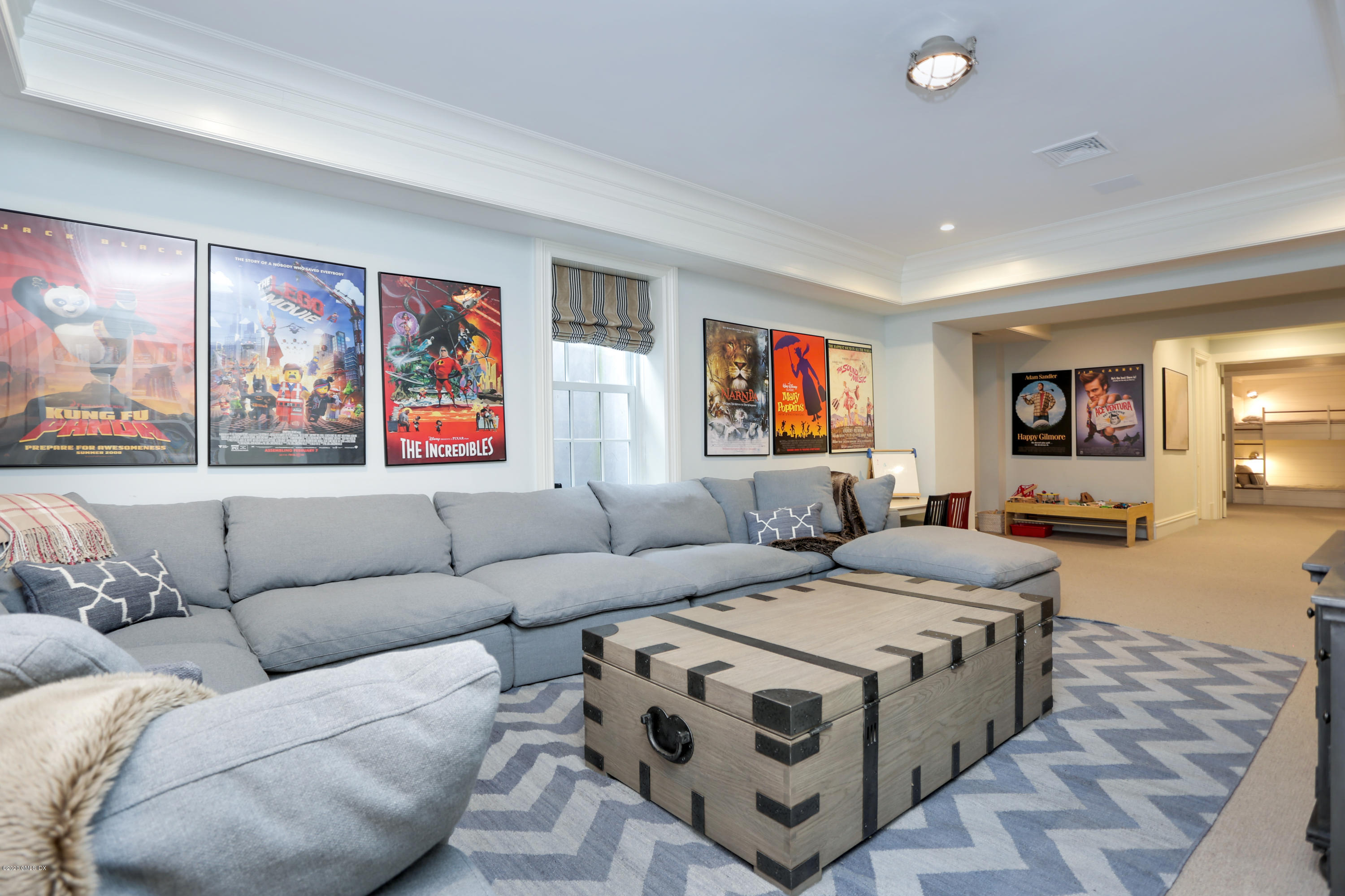 751 Lake Avenue Greenwich, CT 06830 - Photo 28 of 38 a living room with furniture and a flat screen tv
