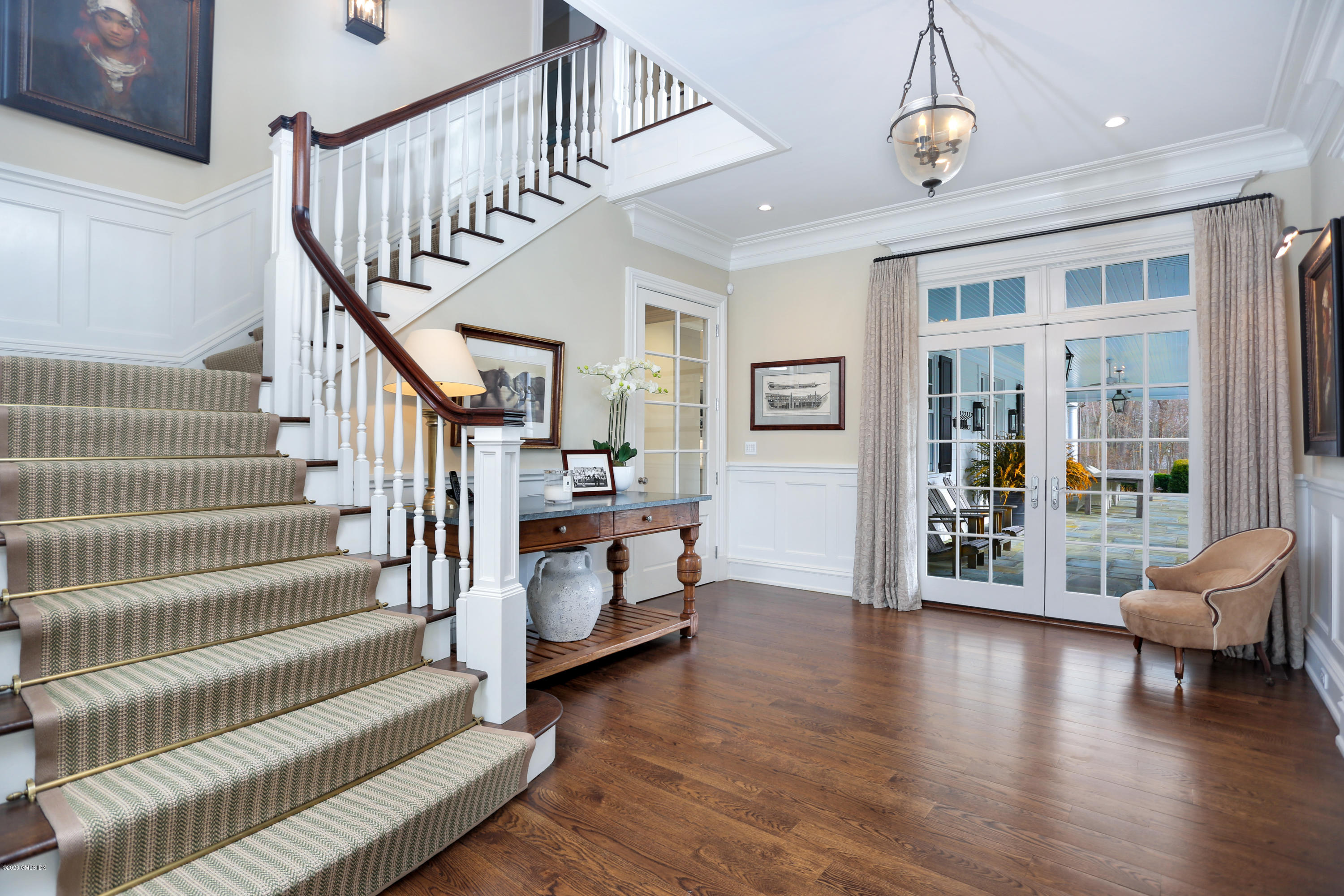 751 Lake Avenue Greenwich, CT 06830 - Photo 3 of 38 a view of entryway and hall with wooden floor