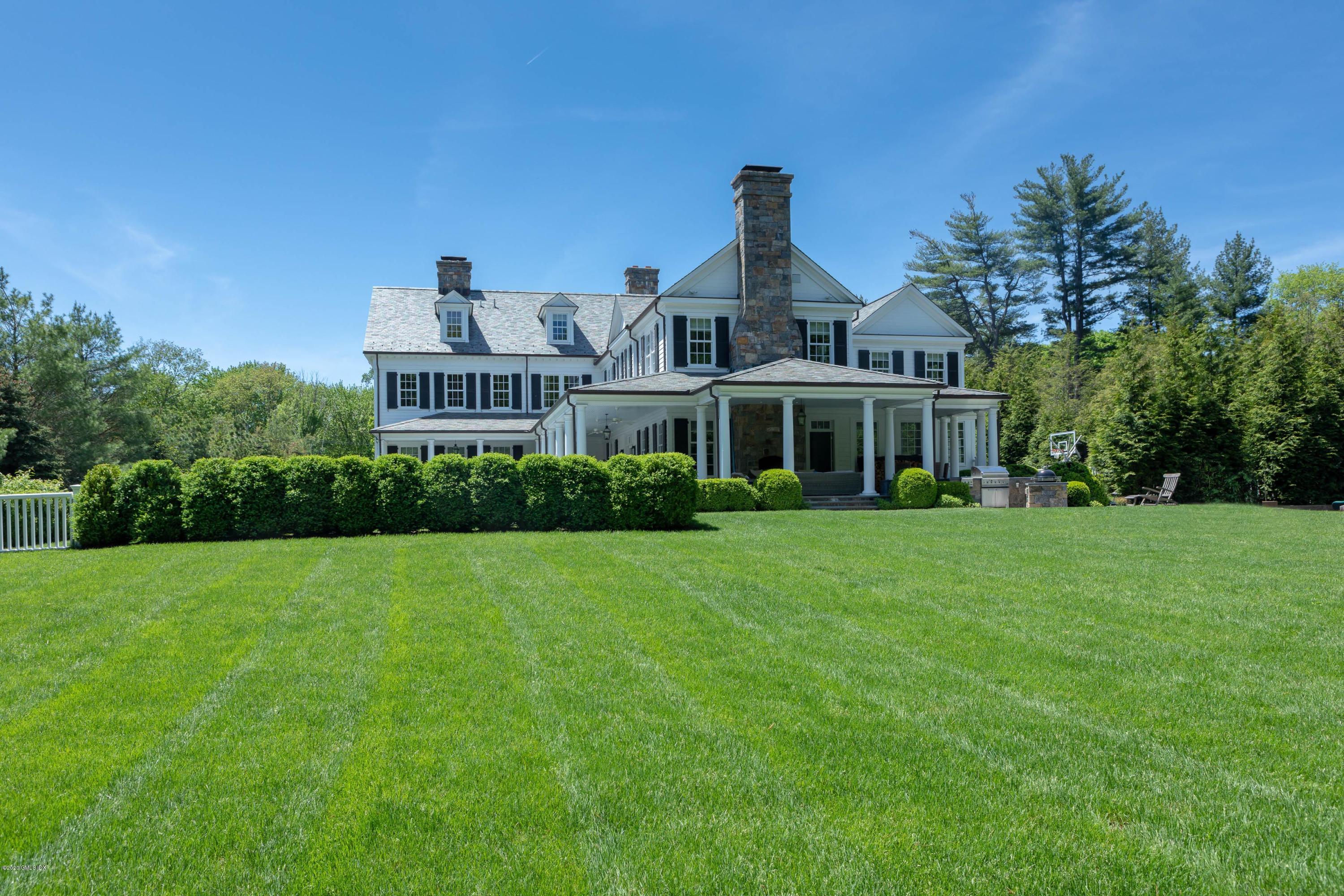 751 Lake Avenue Greenwich, CT 06830 - Photo 36 of 38 a view of a house with a yard