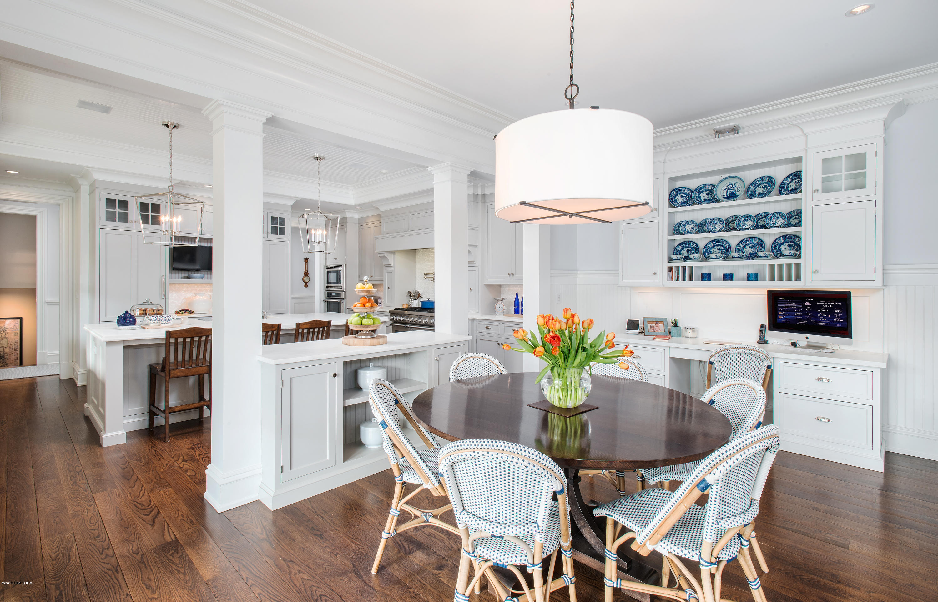 751 Lake Avenue Greenwich, CT 06830 - Photo 10 of 38 a view of a dining room with furniture and wooden floor