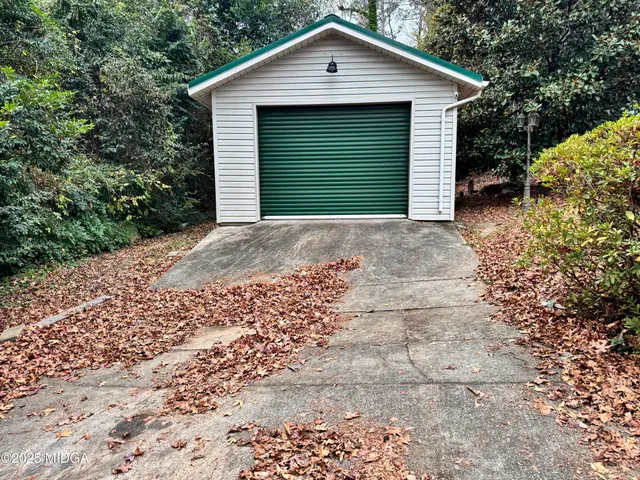 a view of outdoor space and a garage
