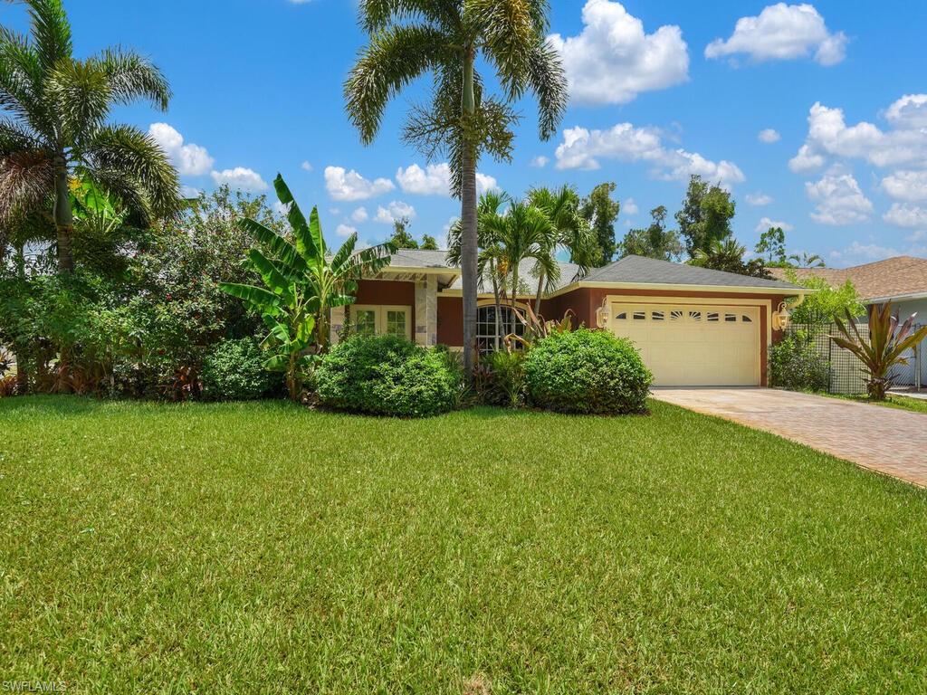 18363 Tulip Road Fort Myers, FL 33967 - Photo 23 of 23 a view of a house with a garden