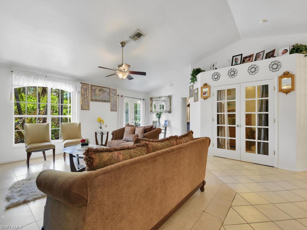 18363 Tulip Road Fort Myers, FL 33967 - Photo 9 of 23 a living room with furniture and windows