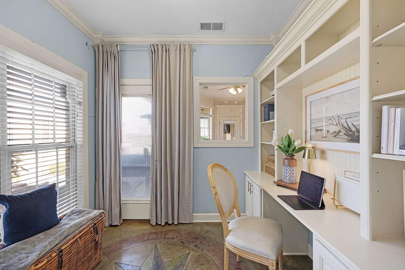621 Wortham Cemetery Road Bells, TN 38006 - Photo 17 of 25 Office with crown molding, built in desk, ceiling fan, and light stone finish floors
