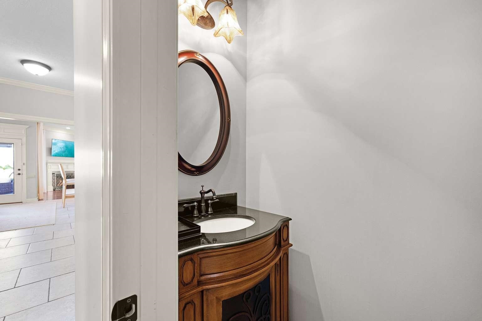 621 Wortham Cemetery Road Bells, TN 38006 - Photo 25 of 25 Bathroom with vanity, tile patterned floors, and ornamental molding