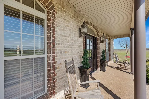 a view of front door and porch
