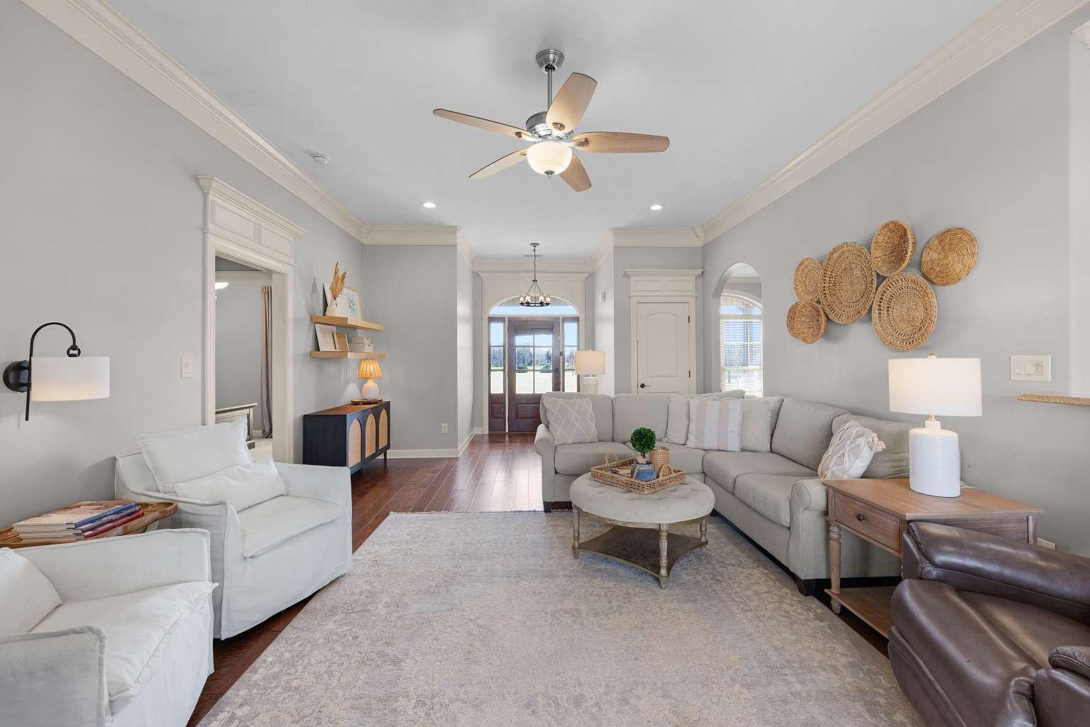 621 Wortham Cemetery Road Bells, TN 38006 - Photo 8 of 25 Living room featuring crown molding, dark wood-style flooring, a ceiling fan, and recessed lighting