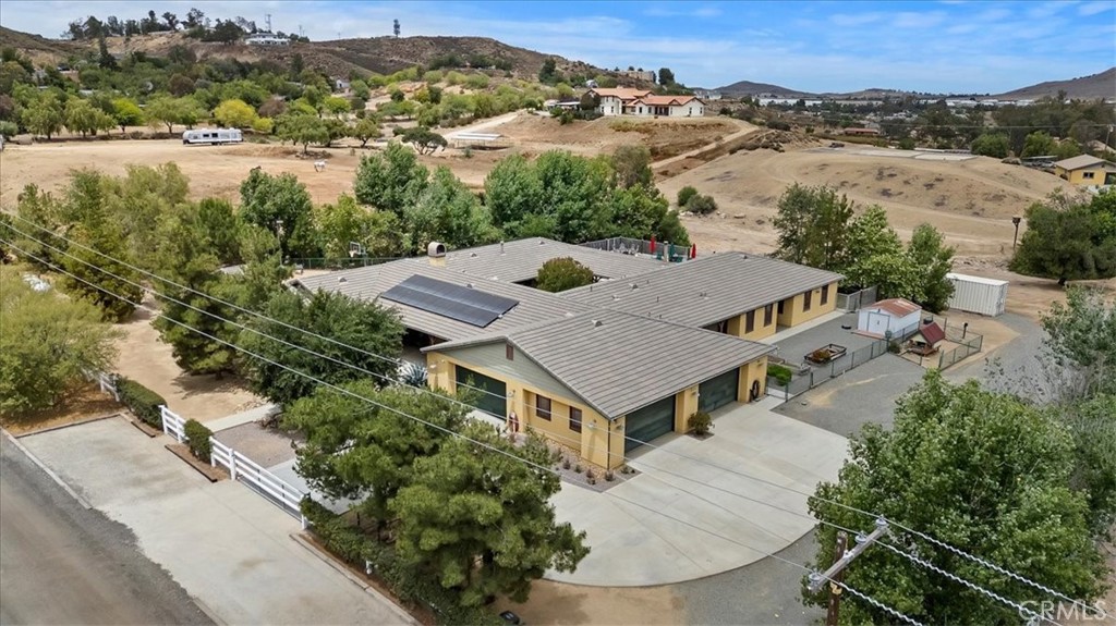 16420 Rocky Glen Road Perris, CA 92570 - Photo 8 of 74 an aerial view of a house with yard and mountain view in back