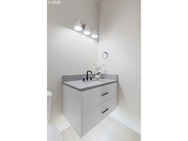 a bed room with a bed and a large window