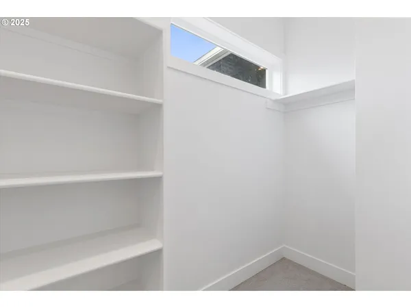 a view of small space with racks on the wall