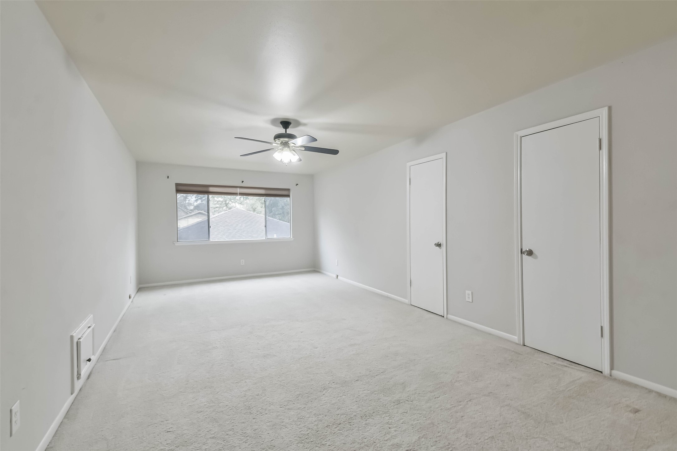 9614 Ballin David Drive Spring, TX 77379 - Photo 24 of 40 a view of an empty room with a window