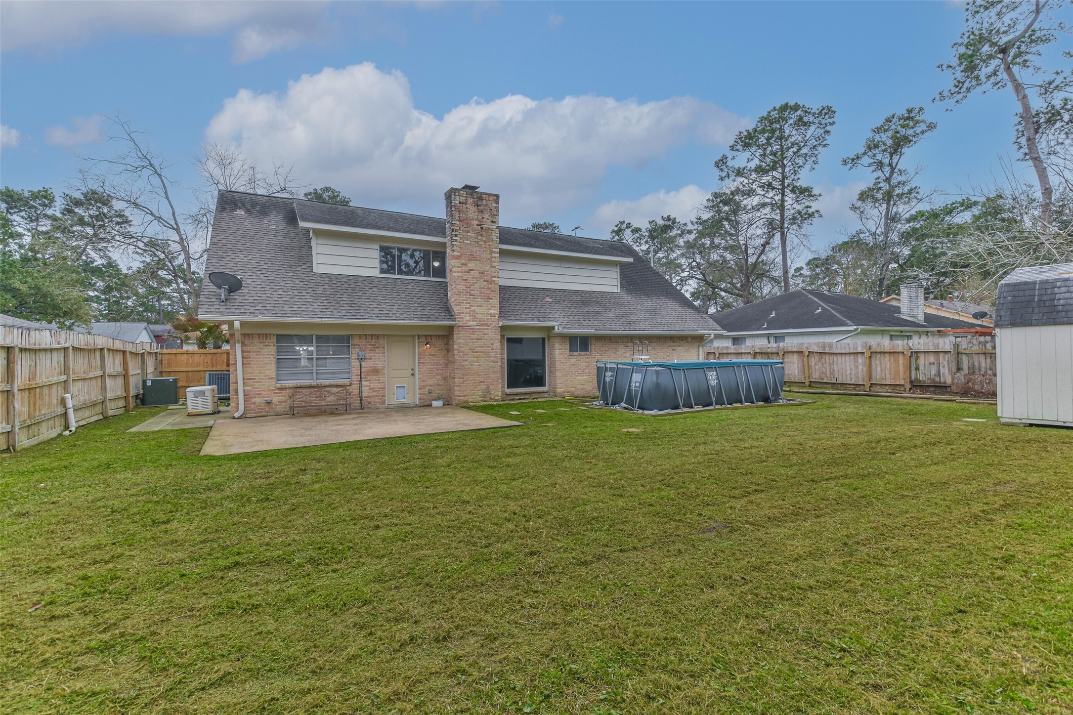 9614 Ballin David Drive Spring, TX 77379 - Photo 32 of 40 a front view of house with yard