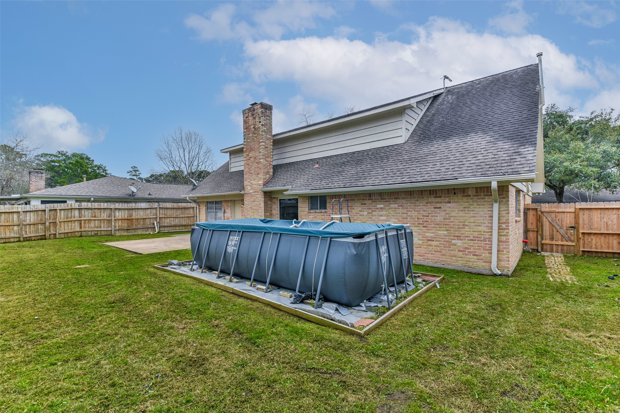 9614 Ballin David Drive Spring, TX 77379 - Photo 33 of 40 a view of a backyard with a tub