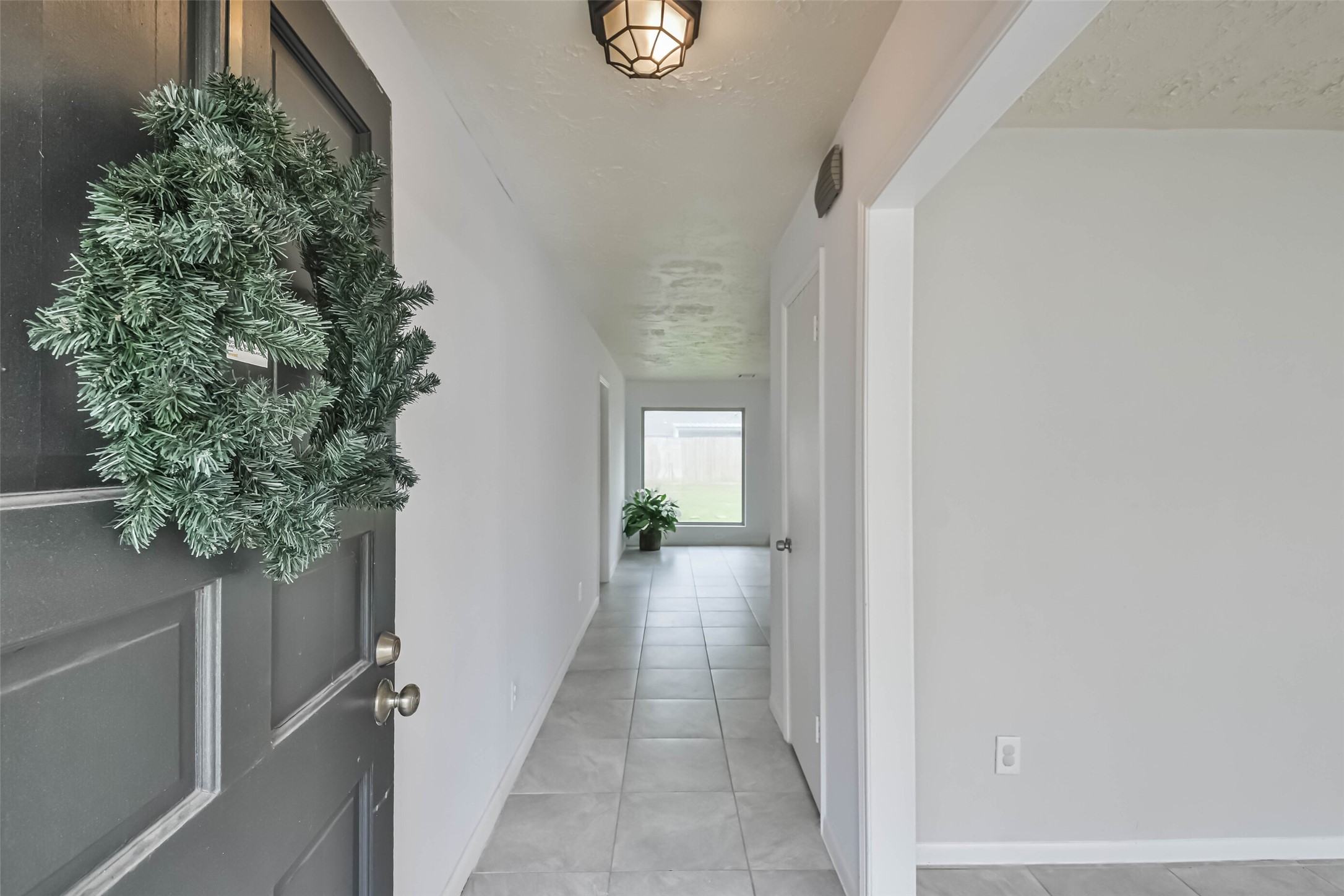 9614 Ballin David Drive Spring, TX 77379 - Photo 5 of 40 a view of a hallway to back yard