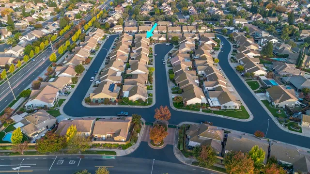 a view of a chairs and table in the patio