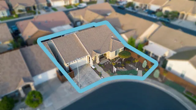 a view of a swimming pool with outdoor seating