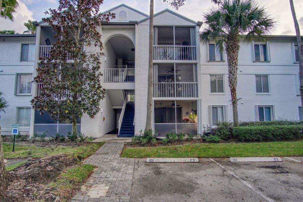 2500 Southeast Anchorage Cove, Unit B2 Port St. Lucie, FL 34952 - Photo 1 of 25 a front view of a house with garden