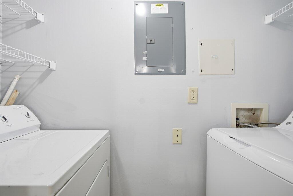 2500 Southeast Anchorage Cove, Unit B2 Port St. Lucie, FL 34952 - Photo 22 of 25 a utility room with dryer and washer