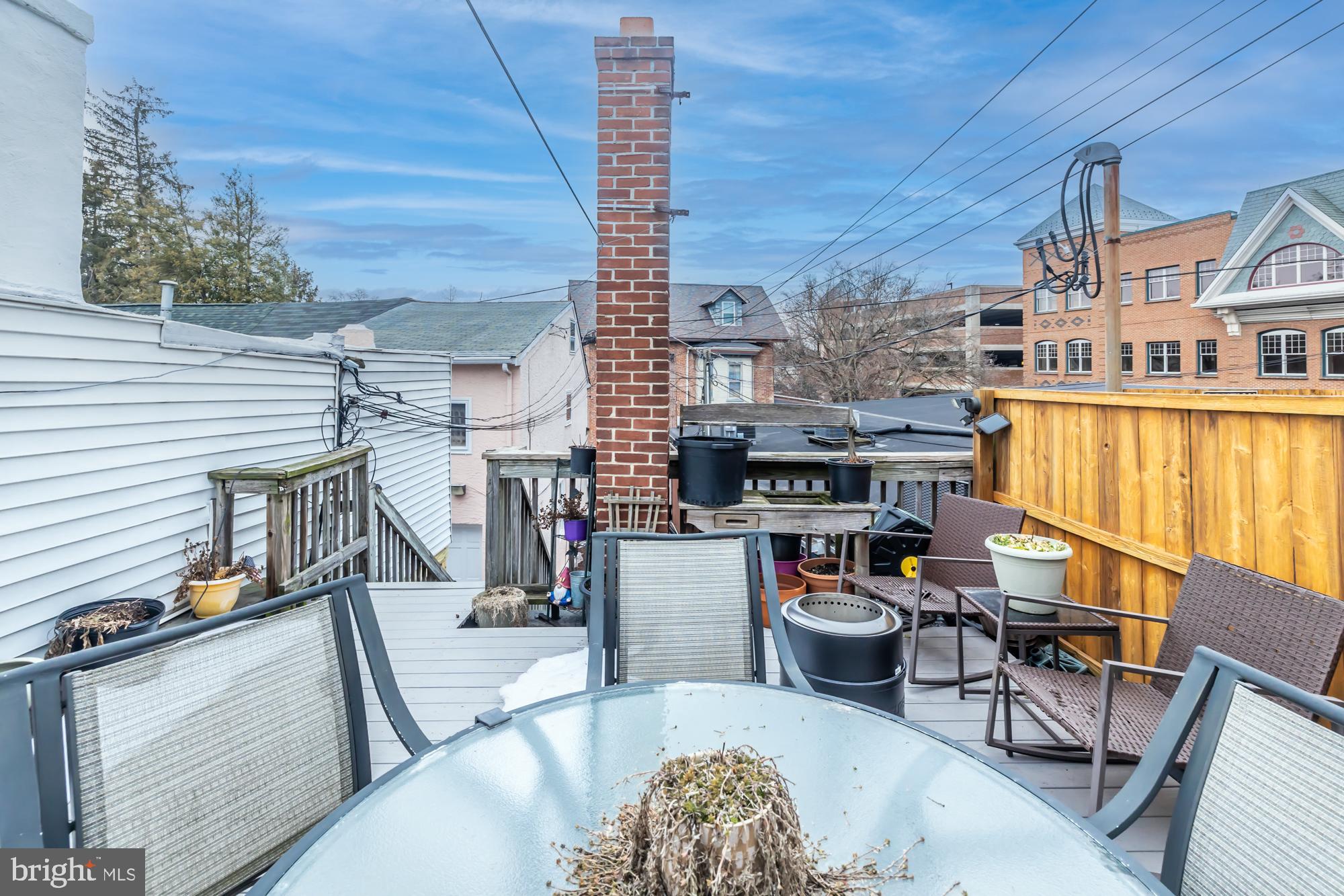 107 West State Street Kennett Square, PA 19348 - Photo 30 of 52 a view of a chairs and table in the balcony