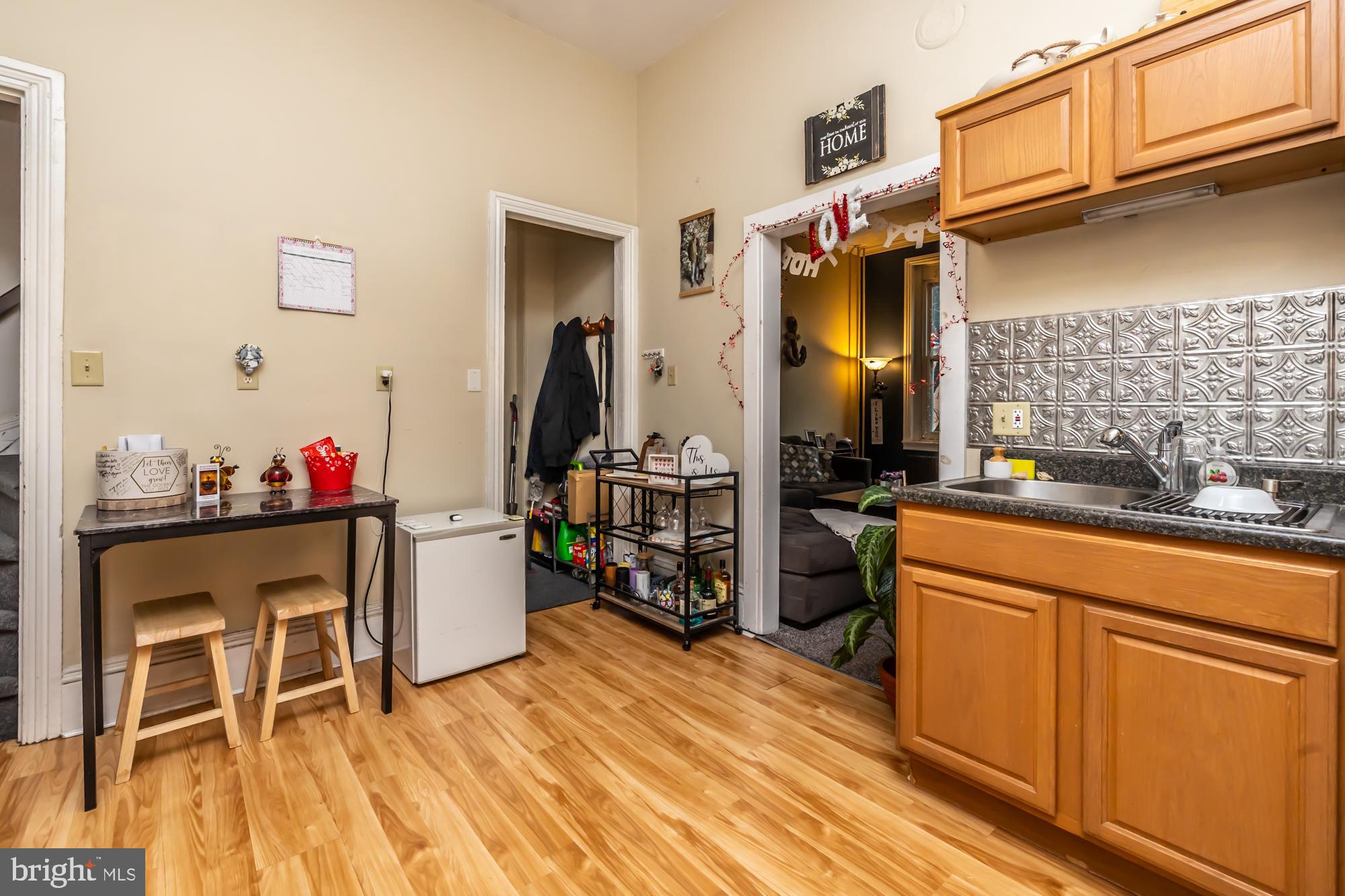 107 West State Street Kennett Square, PA 19348 - Photo 39 of 52 a very nice looking room with a dining table chairs