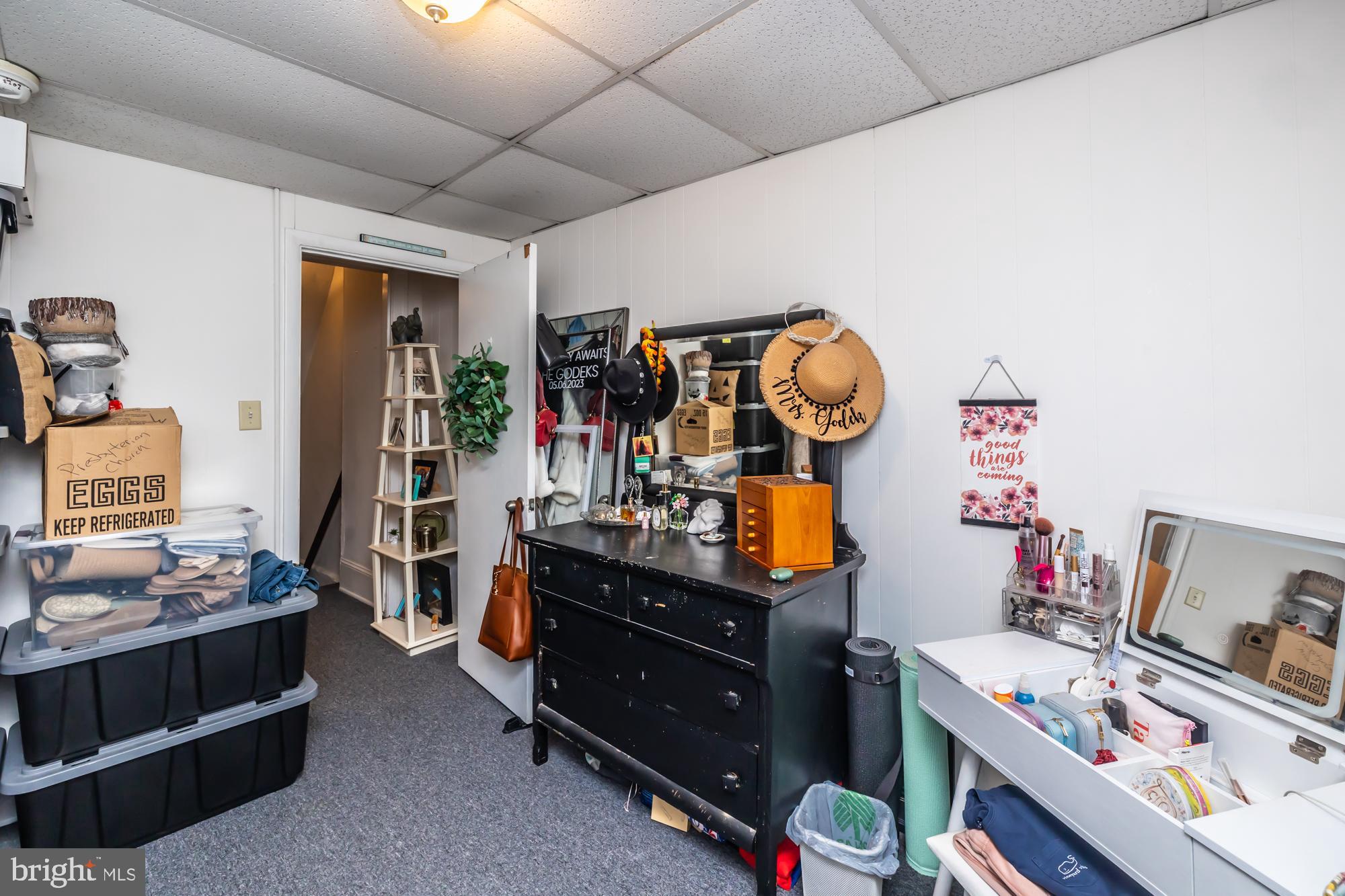 107 West State Street Kennett Square, PA 19348 - Photo 48 of 52 a bed room with a bed and a baby bed