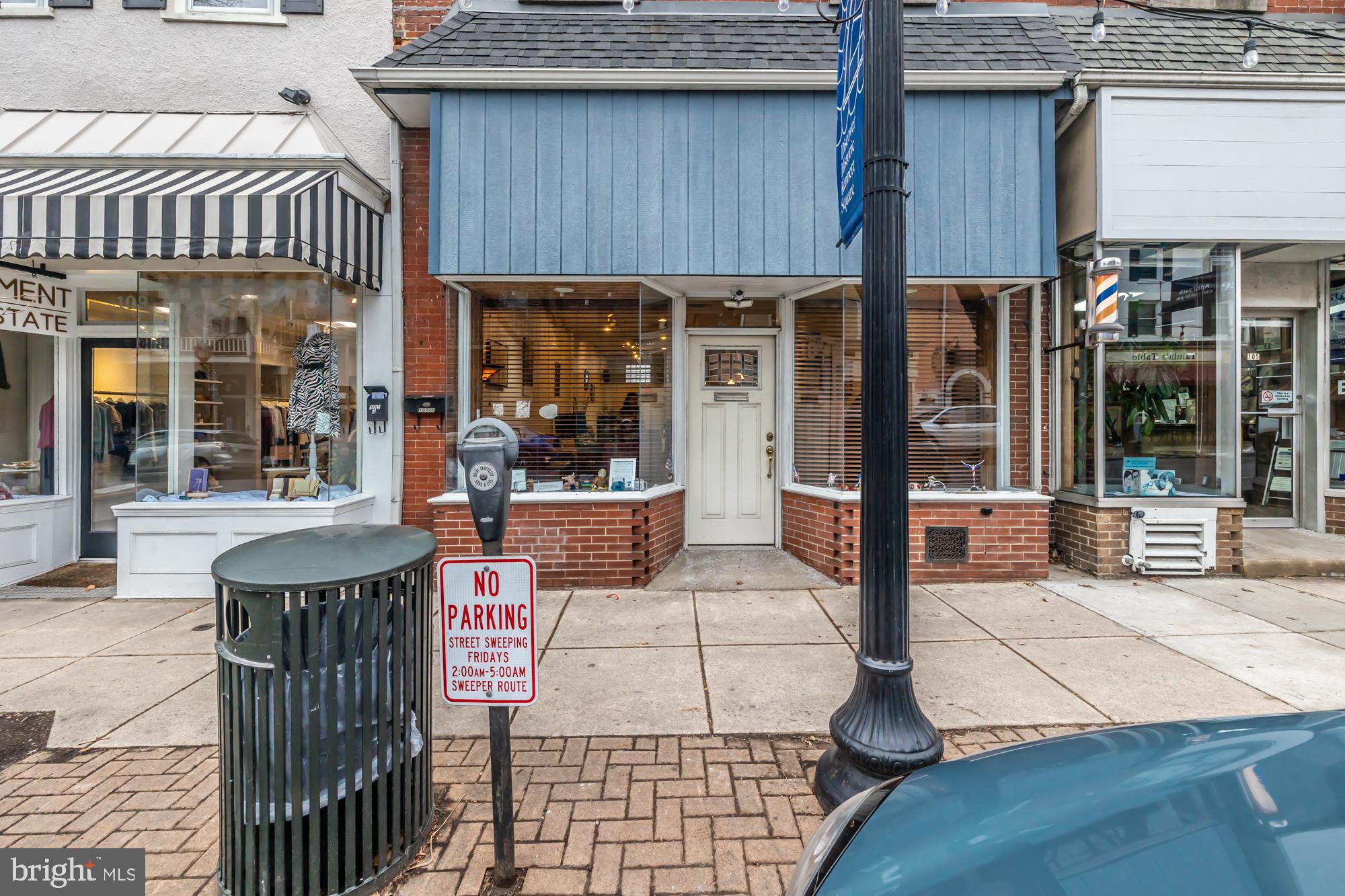 107 West State Street Kennett Square, PA 19348 - Photo 5 of 52 a building outdoor space with patio furniture and potted plants