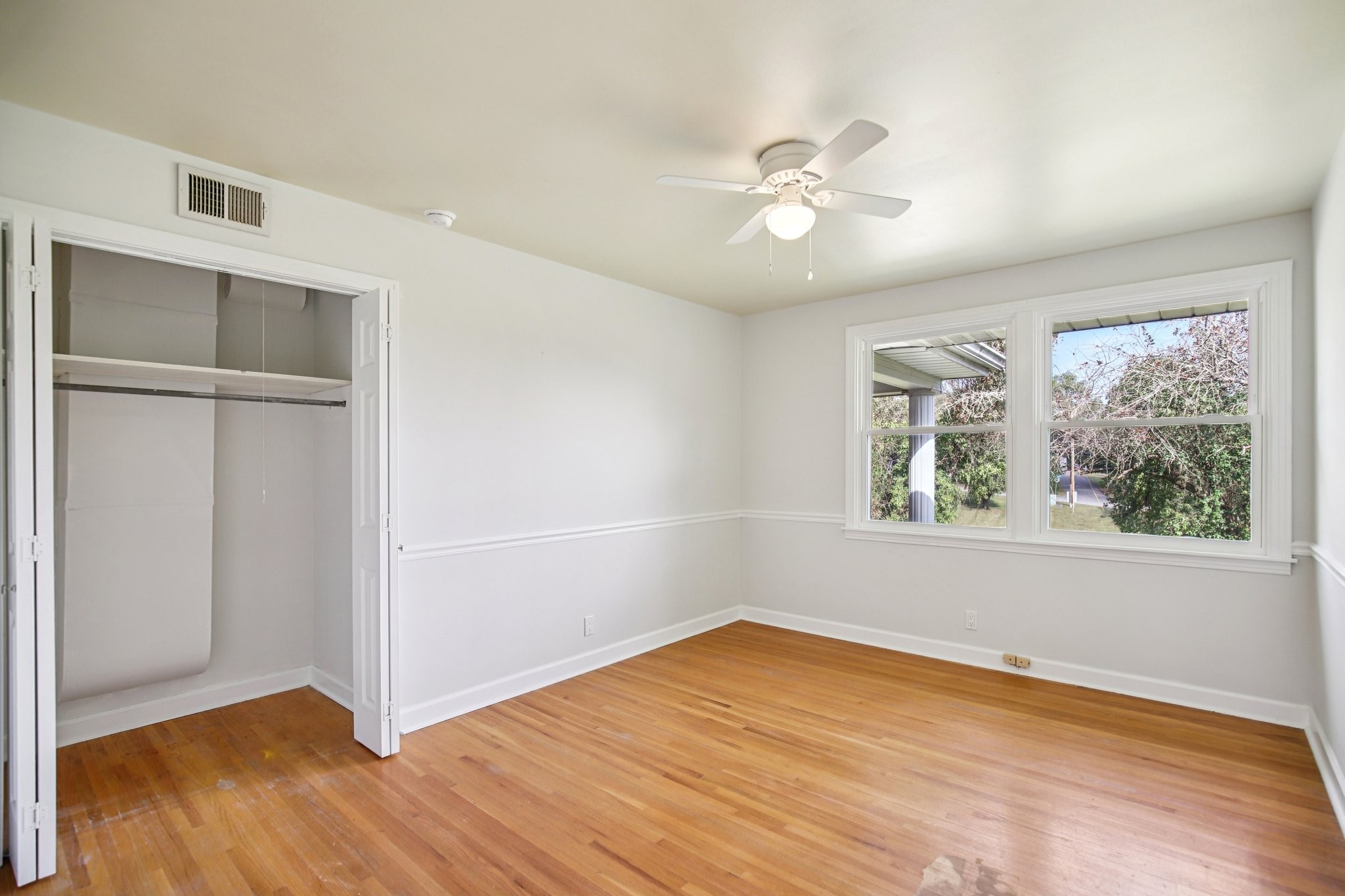 2411 Cloverdale Road Nashville, TN 37214 - Photo 15 of 33 wooden floor in an empty room with a window