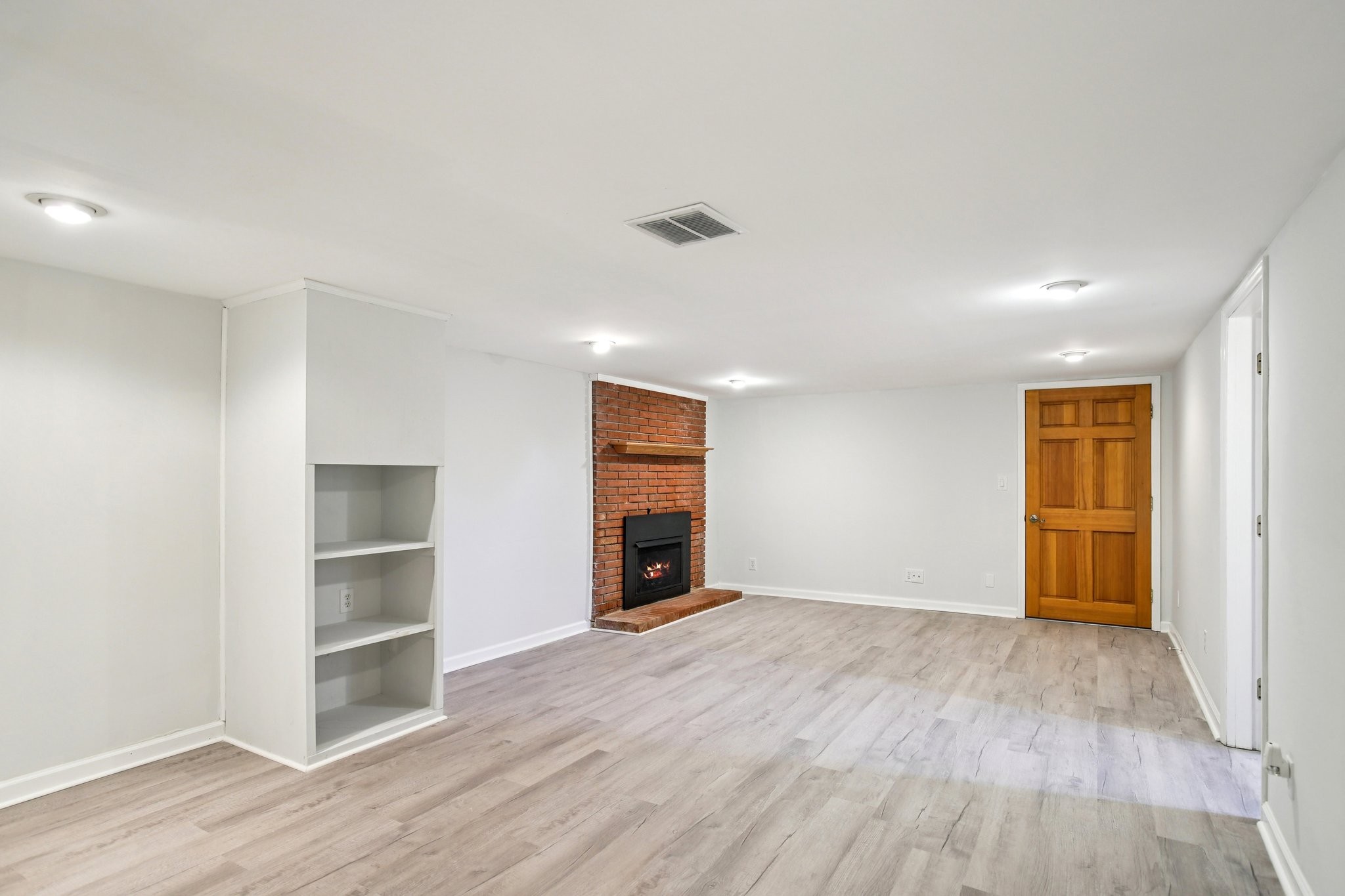 2411 Cloverdale Road Nashville, TN 37214 - Photo 20 of 33 wooden floor in an empty room with a window