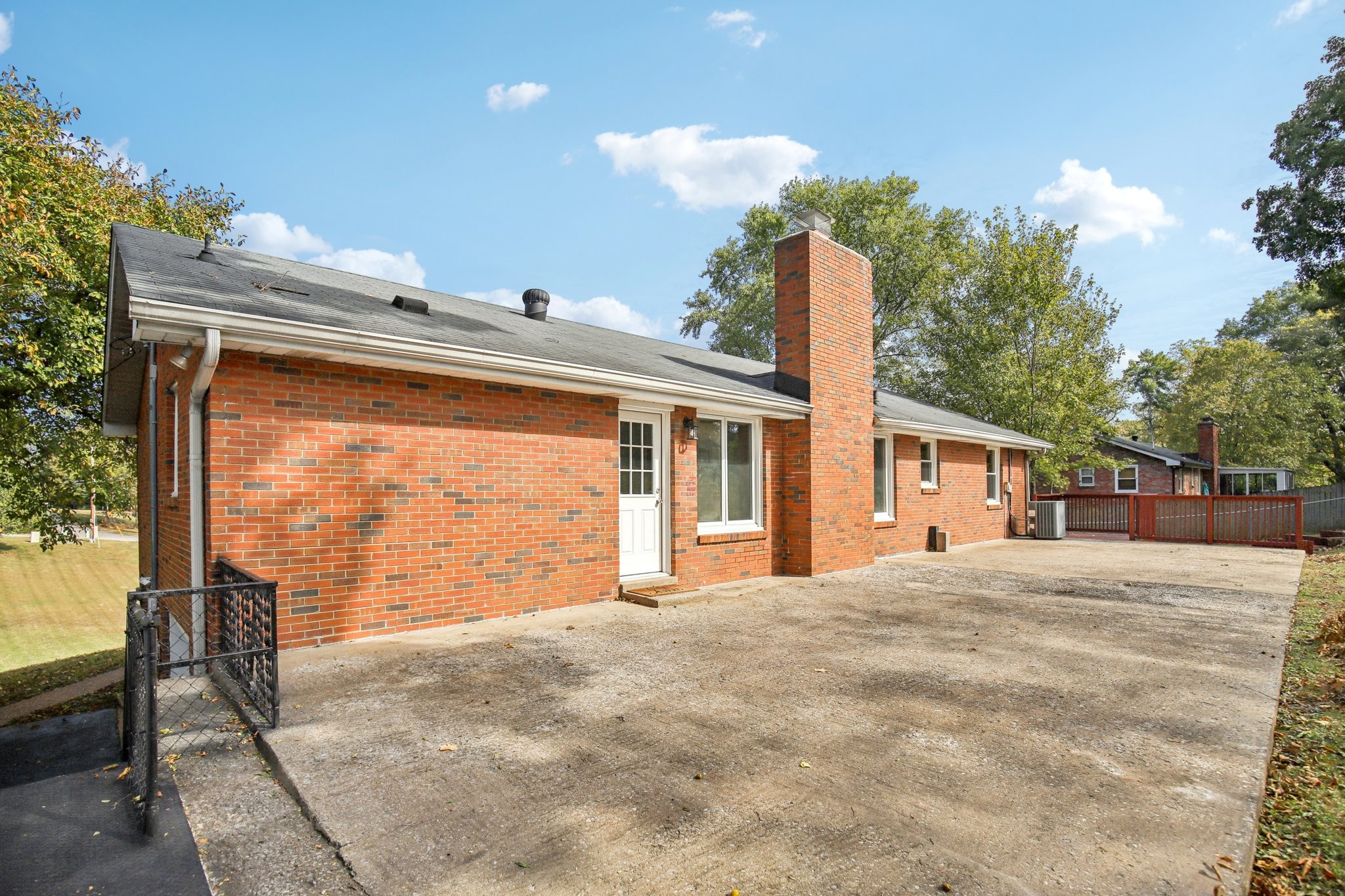 2411 Cloverdale Road Nashville, TN 37214 - Photo 31 of 33 a view of a house with a backyard and a tree