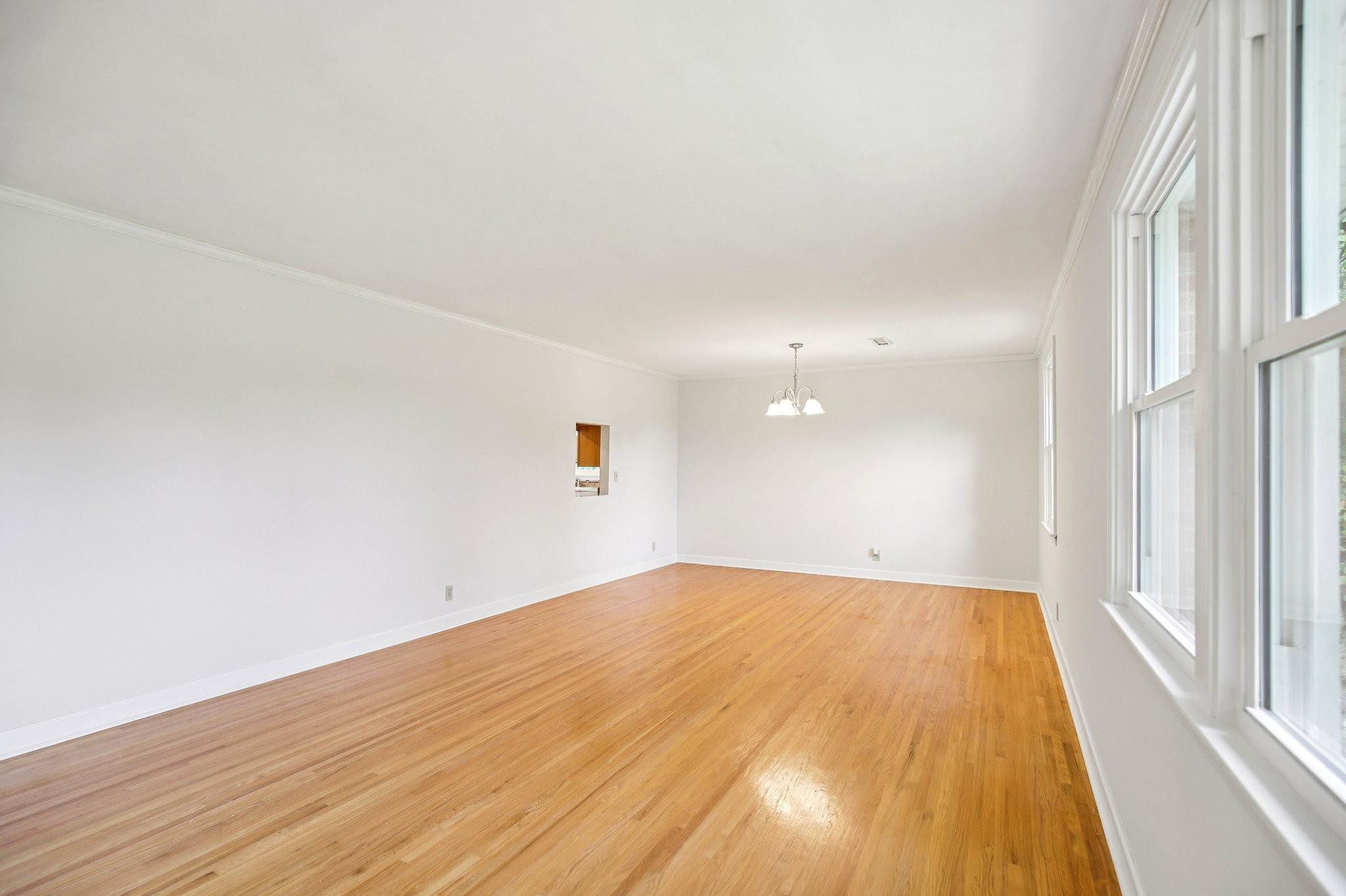 2411 Cloverdale Road Nashville, TN 37214 - Photo 5 of 33 a view of empty room with wooden floor and fan