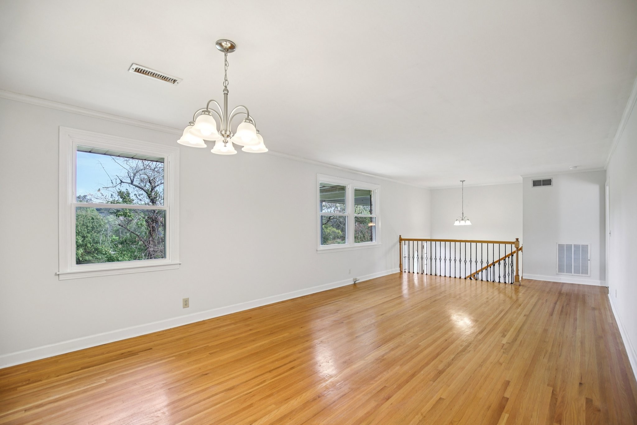 2411 Cloverdale Road Nashville, TN 37214 - Photo 6 of 33 a view of a room with wooden floor and windows