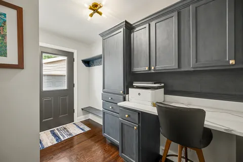 a kitchen with a cabinets and appliances