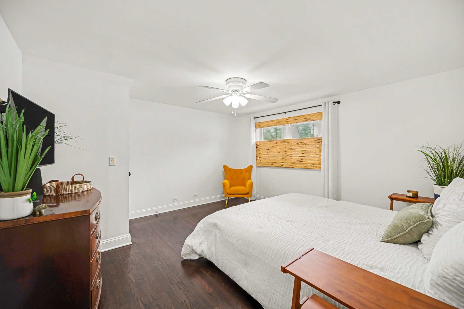 3S171 Arboretum Road Glen Ellyn, IL 60137 - Photo 16 of 41 a bedroom with a bed and wooden floor