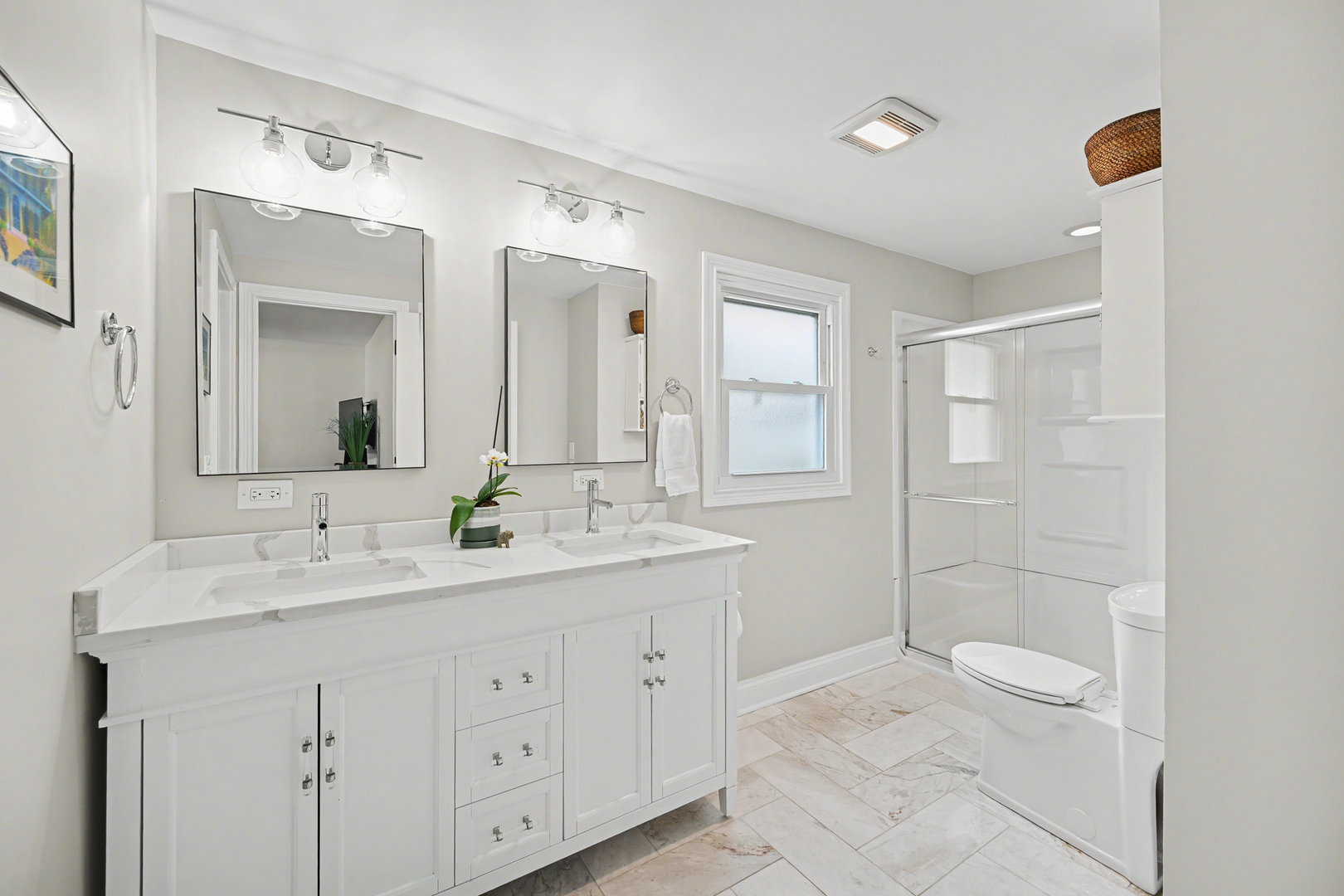 3S171 Arboretum Road Glen Ellyn, IL 60137 - Photo 18 of 41 a spacious bathroom with double sink a toilet a shower and a mirror