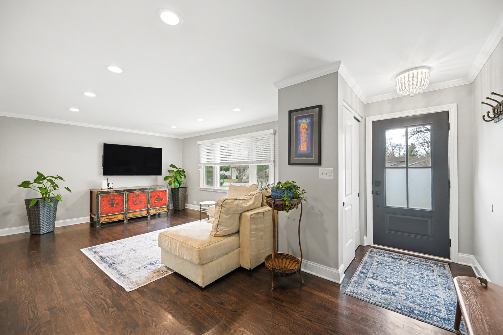3S171 Arboretum Road Glen Ellyn, IL 60137 - Photo 2 of 41 a living room with furniture and a flat screen tv