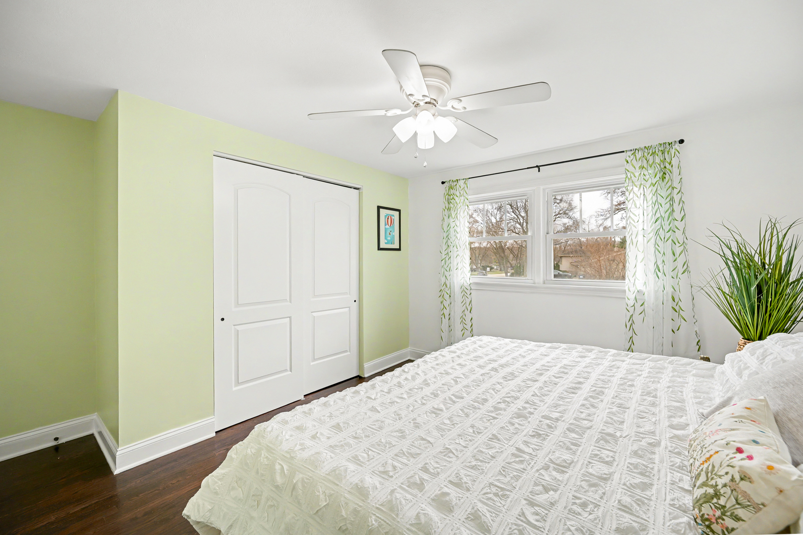 3S171 Arboretum Road Glen Ellyn, IL 60137 - Photo 21 of 41 a bedroom with a large bed and a window