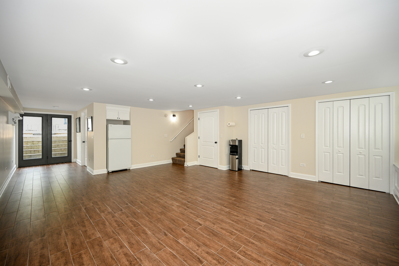 3S171 Arboretum Road Glen Ellyn, IL 60137 - Photo 24 of 41 a view of an empty room with wooden floor and a window